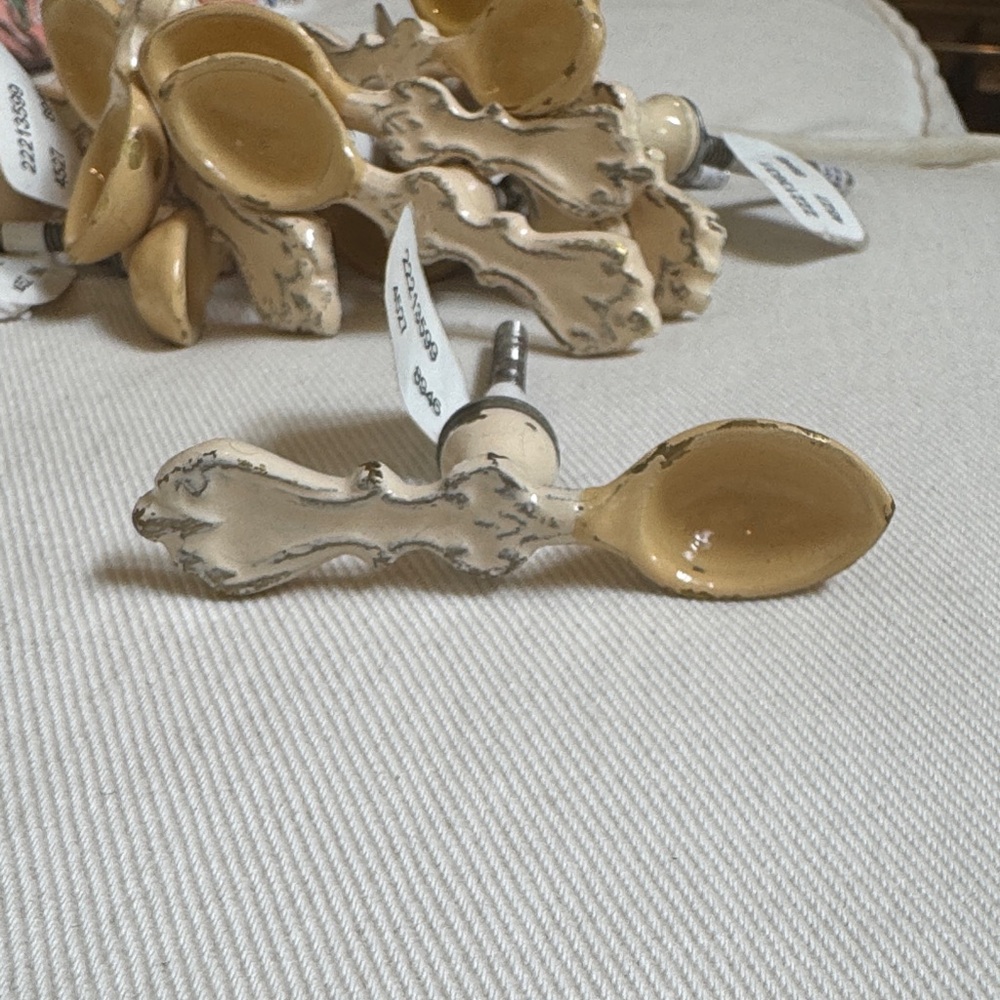 Anthropologie drawer knobs. Spoon and handle shape. Set of 14. New with tags